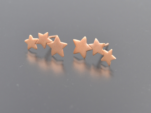 Ohrstecker "Sternenreihe", rosevergoldet matt